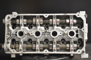 Kia 1.6L 1600cc L4 DOHC Cylinder Head - 1